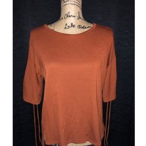 Loose scoop neck blouse with tied sleeves